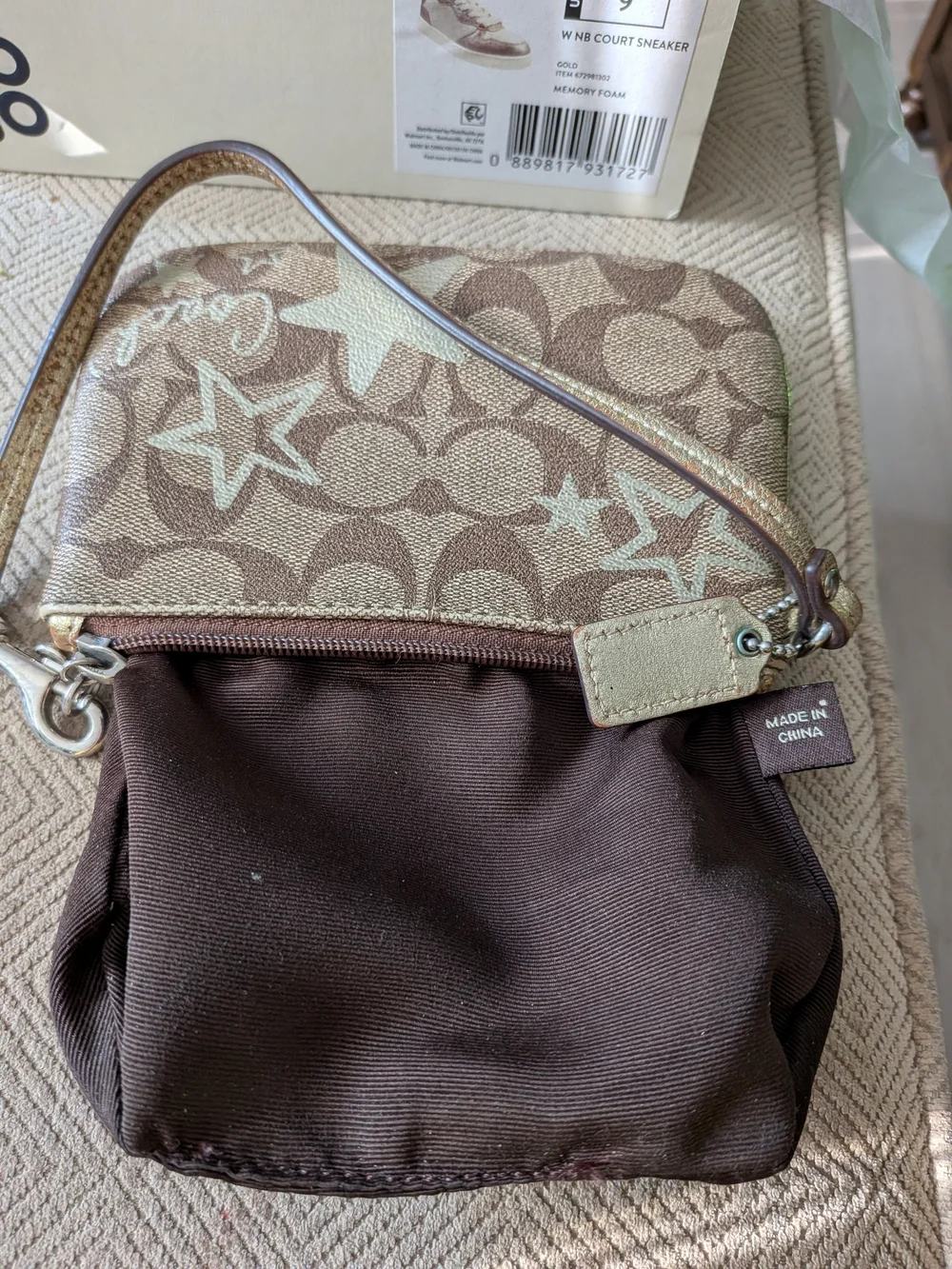 Coach Corner Zip Wristlet in Signature Canvas with Metallic Star Print.
